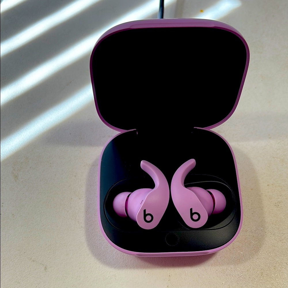 Beats Pink Wireless Earbuds. New without tags. Never used.